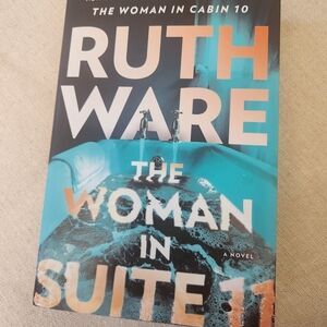 'The Woman in Suite 11' Novel - Black and Blue Cover
